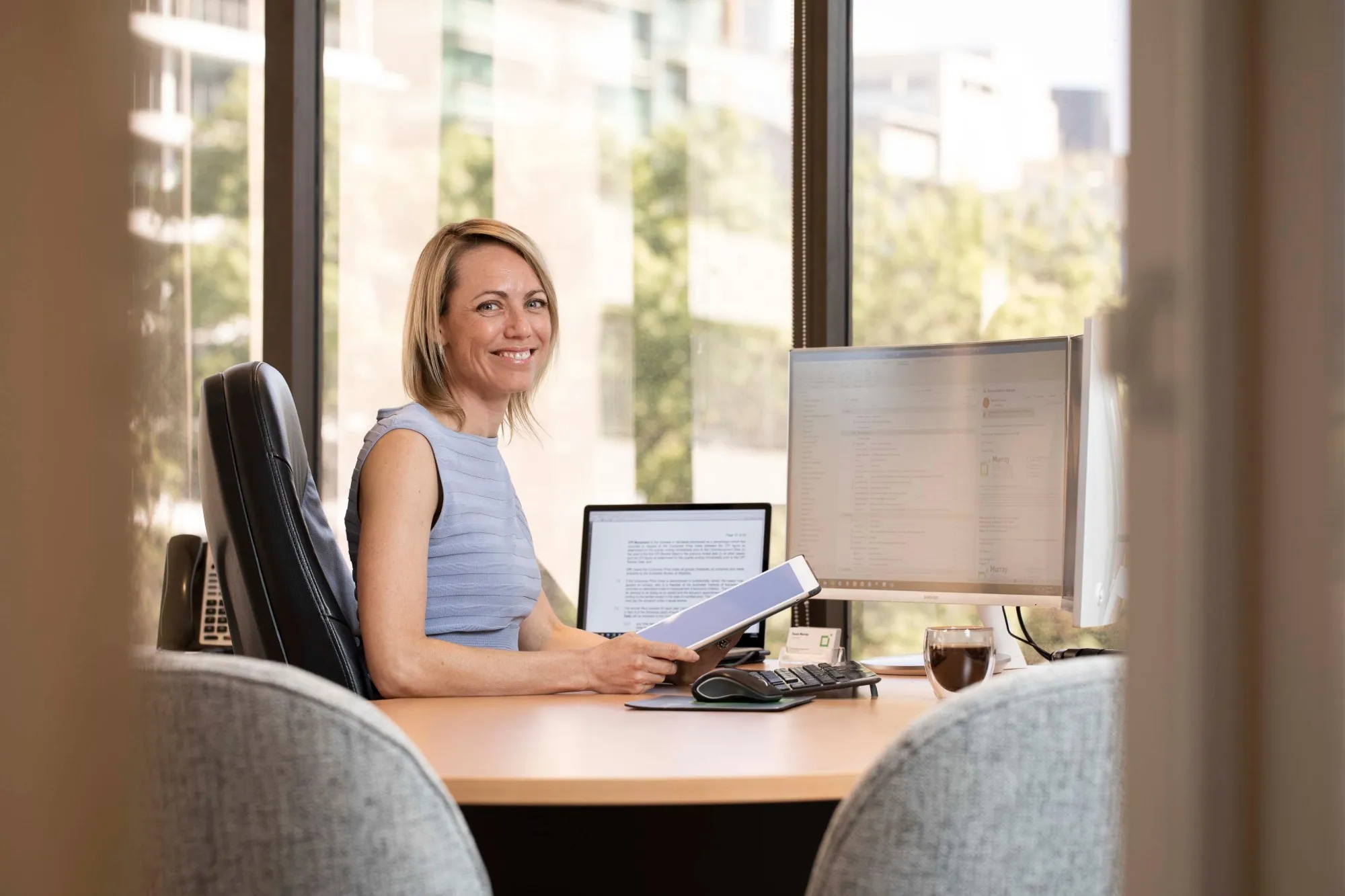 Paula Murray at her desk